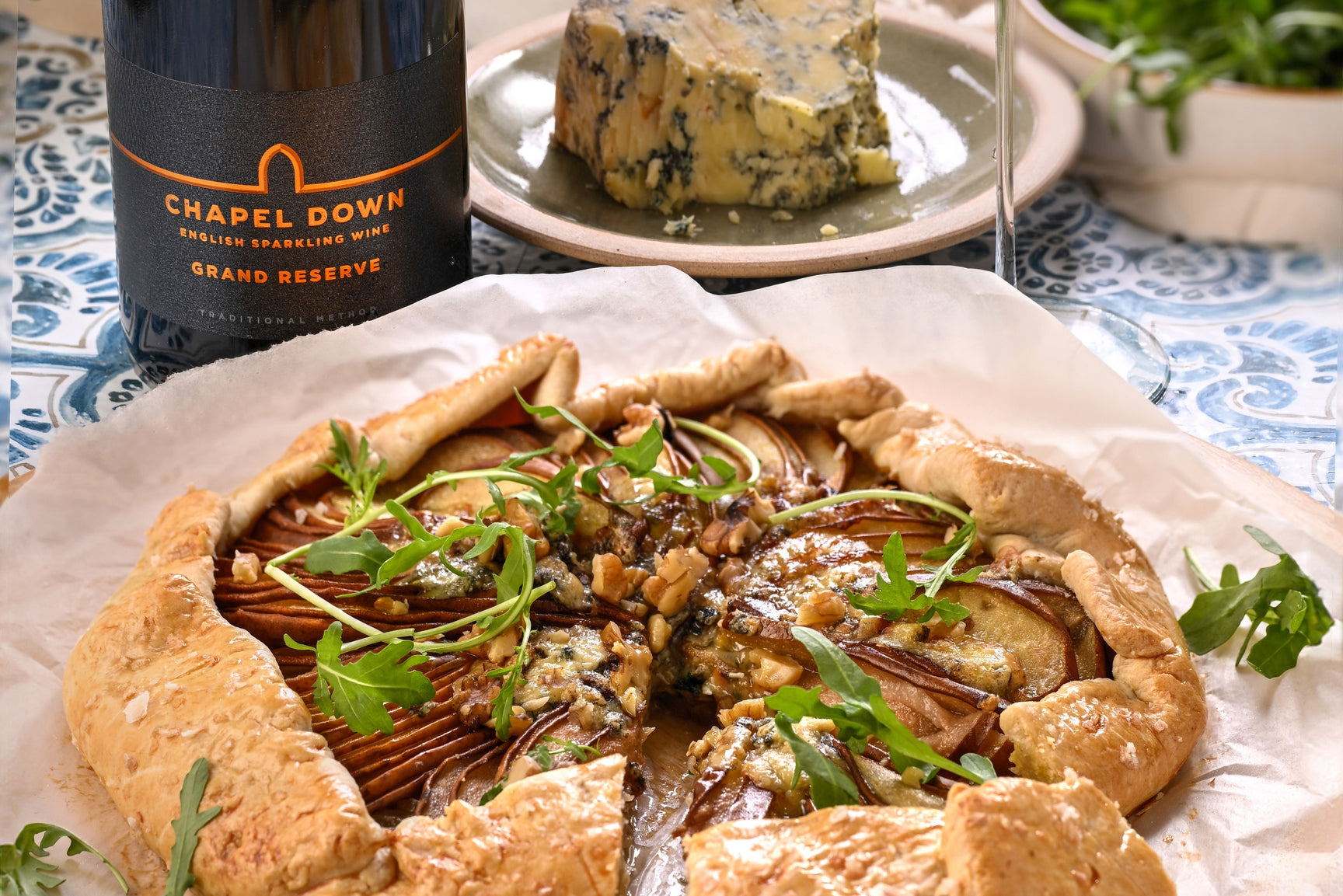 HONEY, CARAMELISED PEAR AND BLUE CHEESE TART SERVED WITH GRAND RESERVE 2019